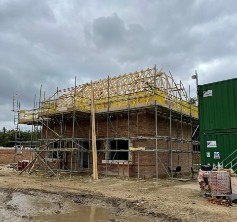 Brickwork up to roof and trusses